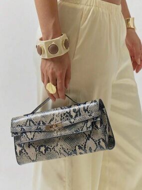 NWT Snakeskin vegan leather Top-Handle Clutch in Black & Cream